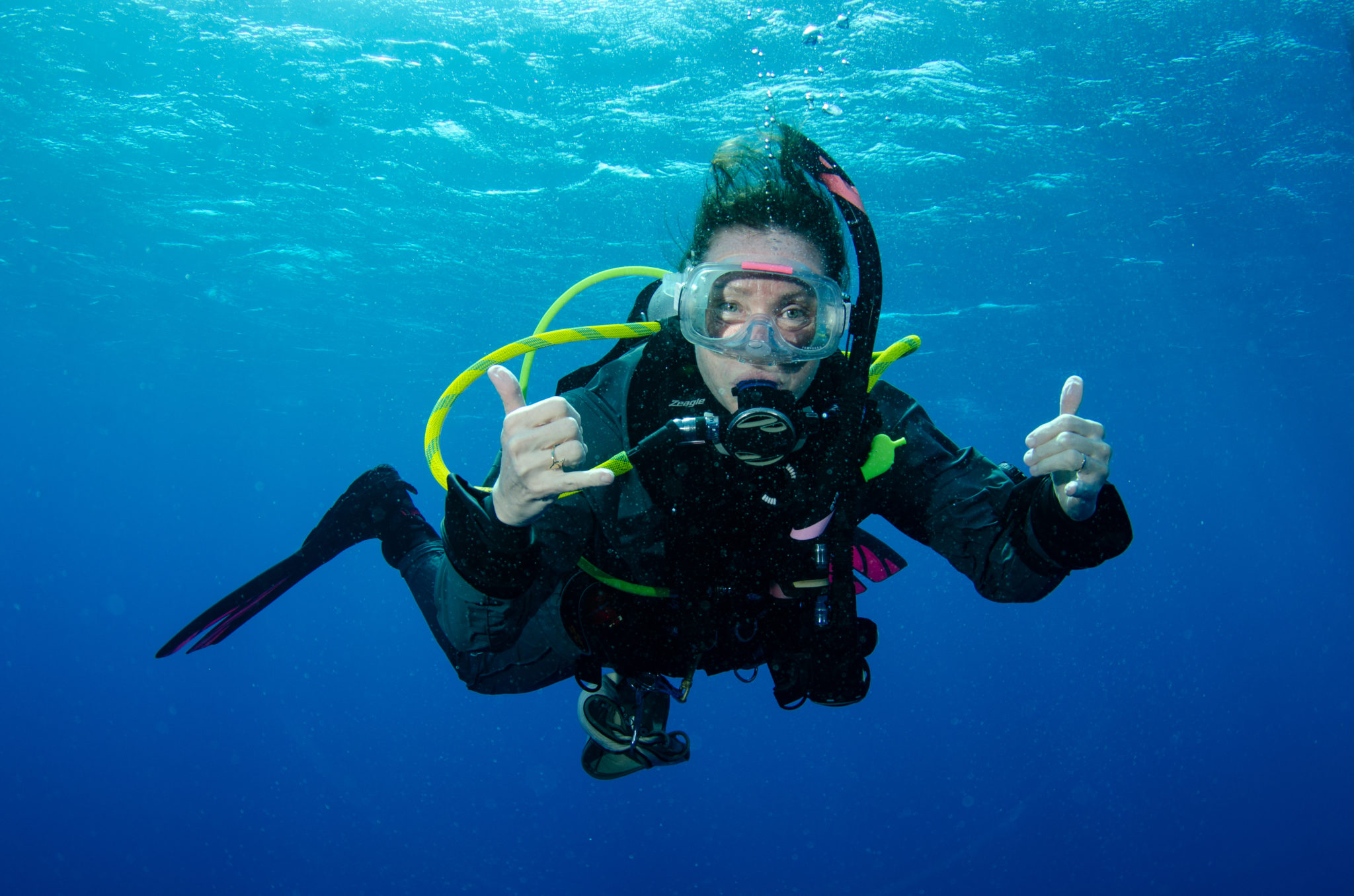 Scuba diver underwater giving thumbs up