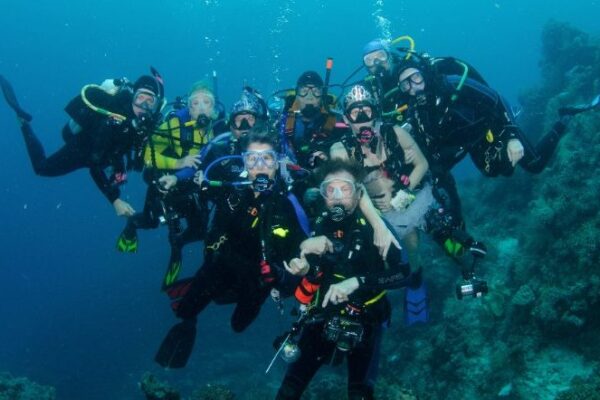 Group of scuba divers underwater
