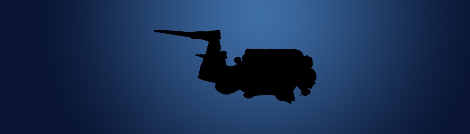 Silhouetted diver underwater in deep blue sea.